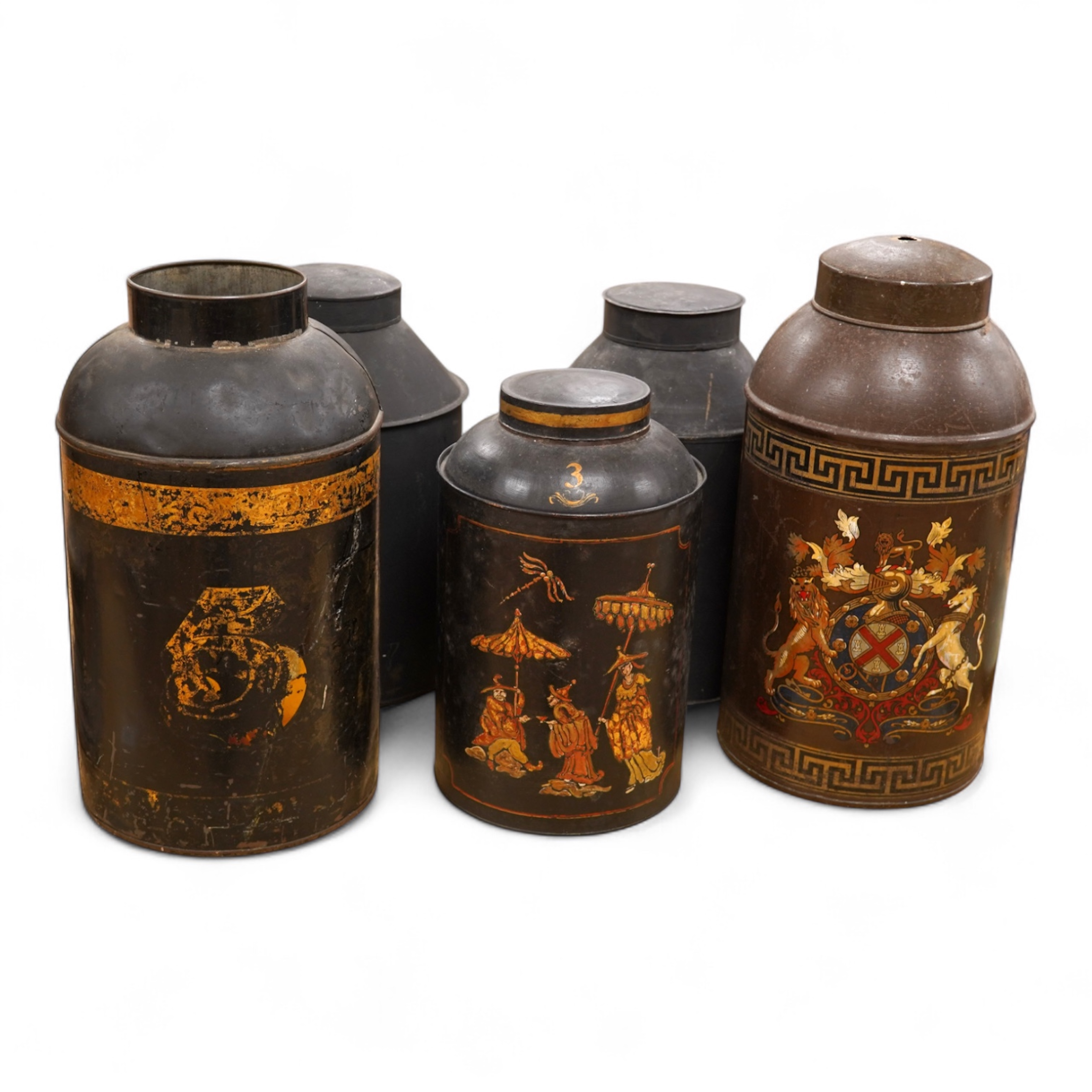 Five 19th century toleware tea canisters, largest 43cm